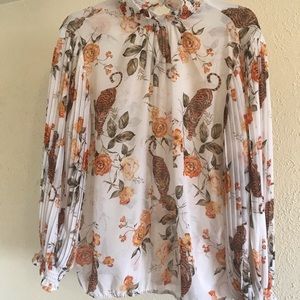 Brand new lightweight animal print top.